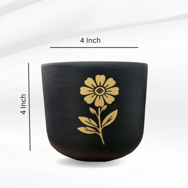 terracotta golden flower black pot
